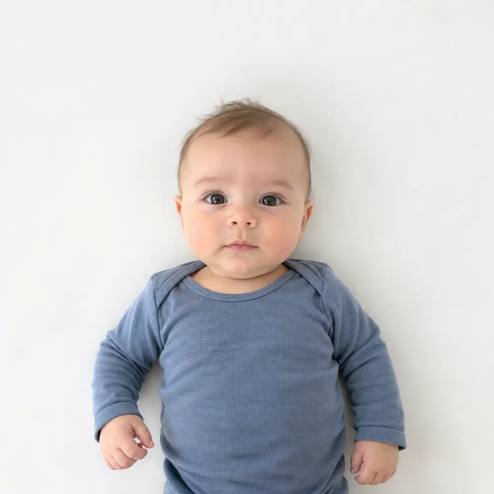 Newborn on a white sheet
